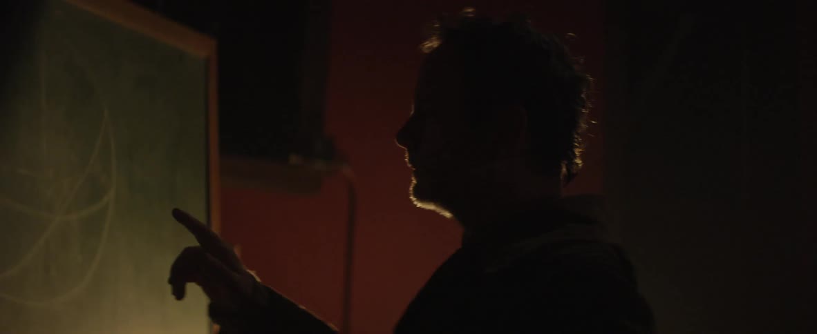 A person walking in the dark