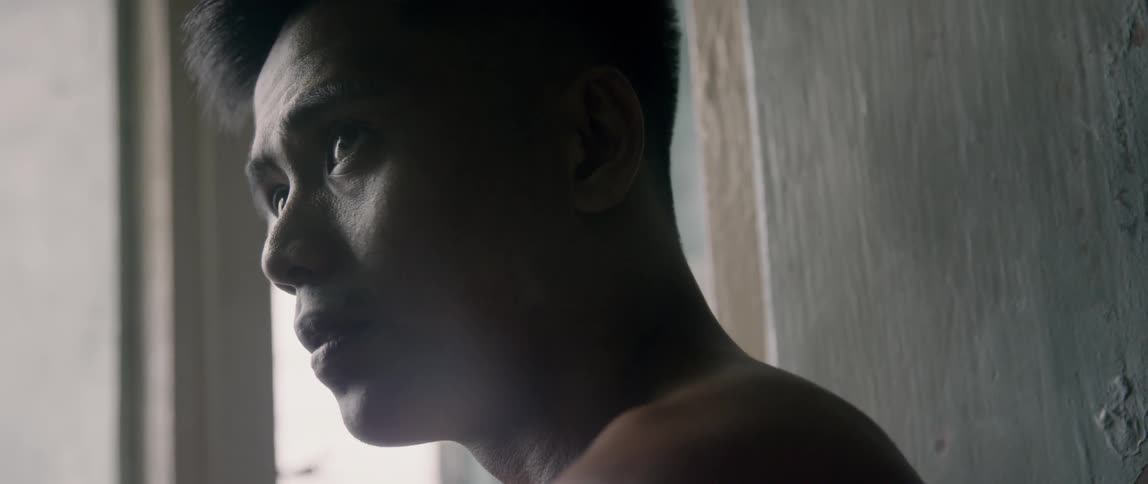 A man looks around inside a room
