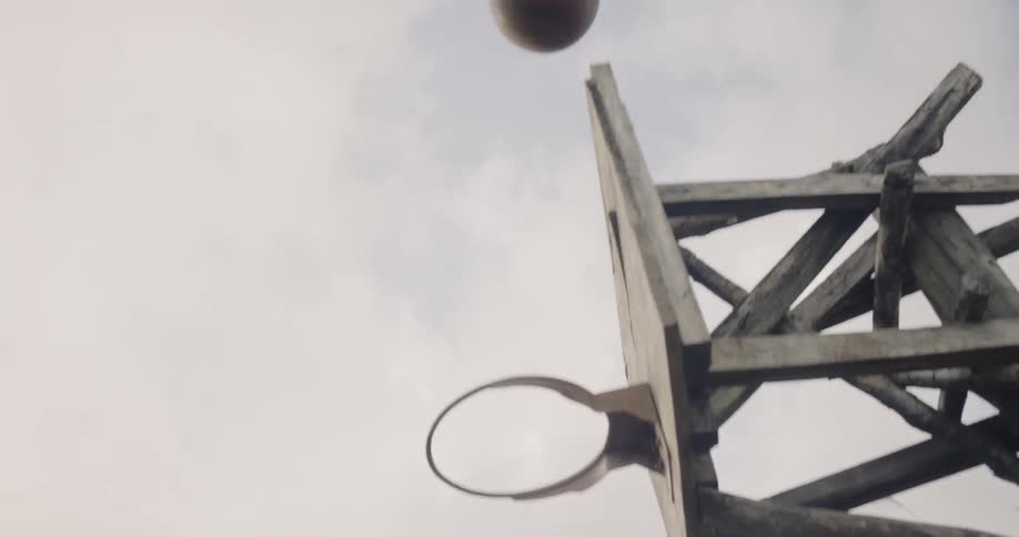 A child shoots the ball in a basketball game