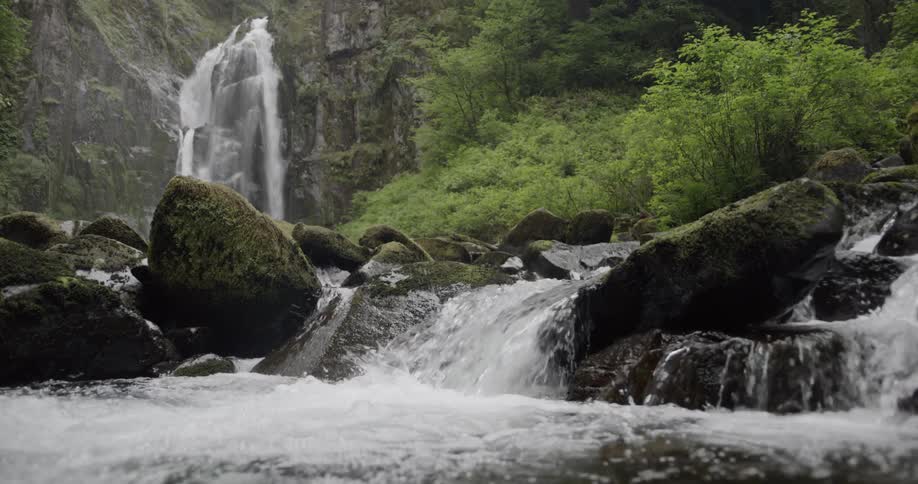 Water flows over the rocks into the creek
