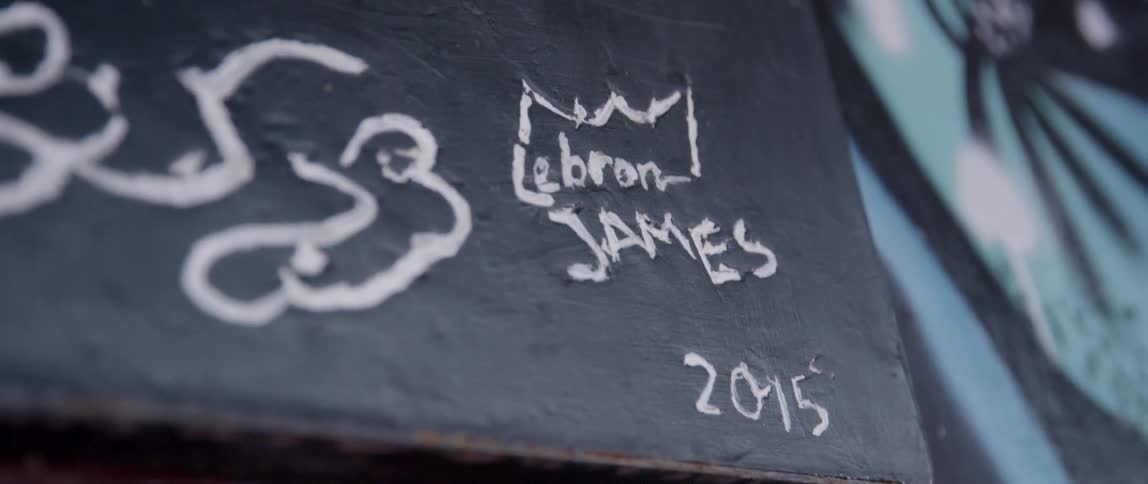 The wall has some writing on it with a date