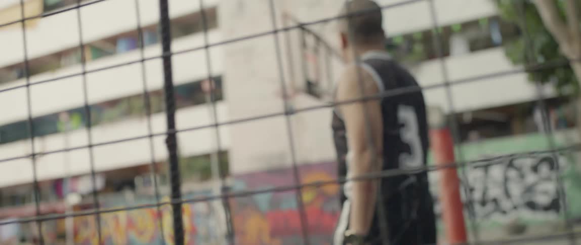 Person walks onto a basketball court