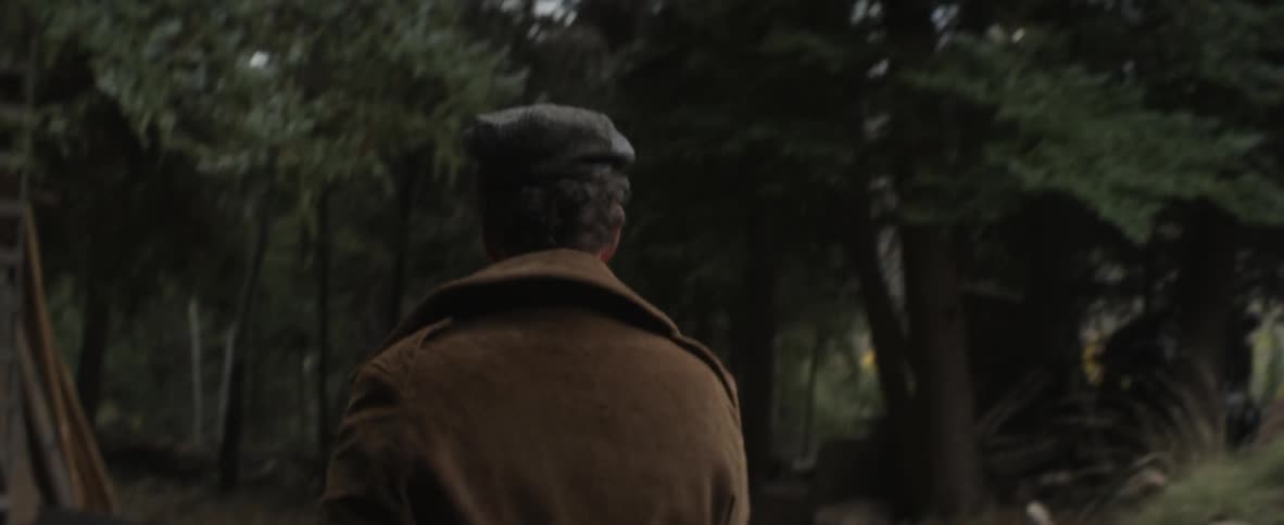 A man walking into the woods