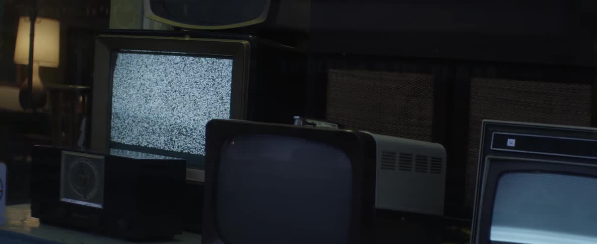 Television monitors some with static