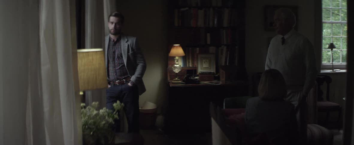 Man standing next to a window runs off
