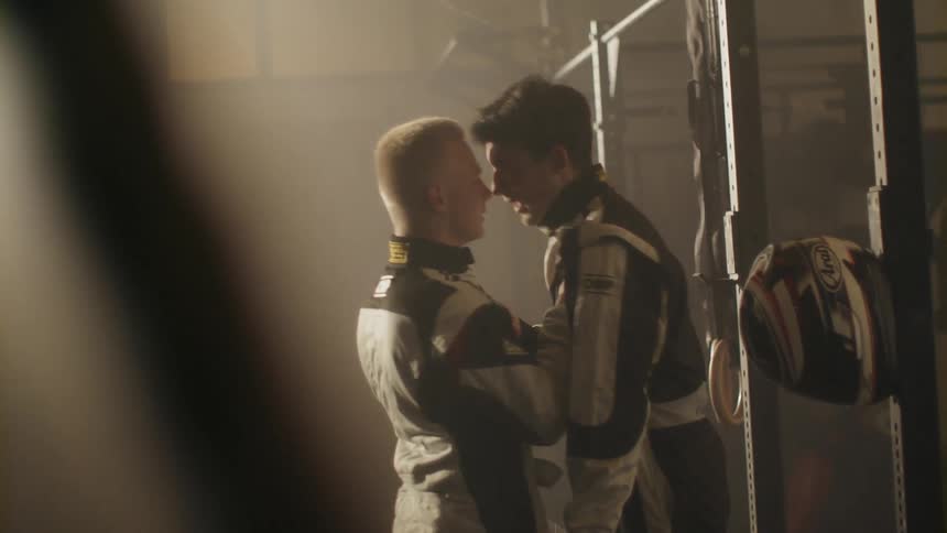 Two people have an argument and push each other