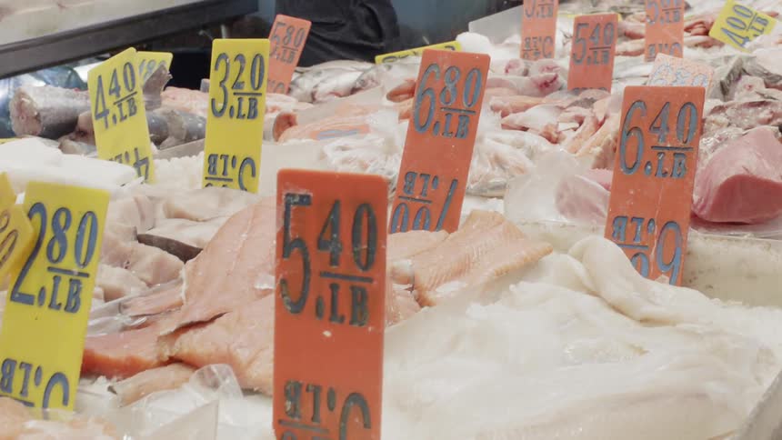 The store table is covered with seafood for sale