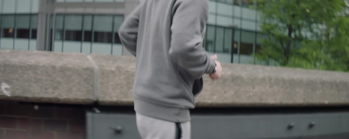 Man is jogging in city