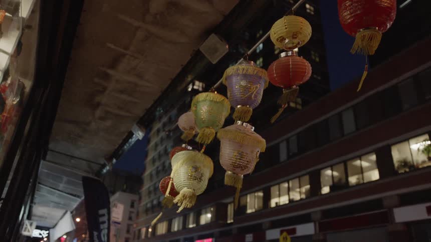 The paper lamps hang from the roof