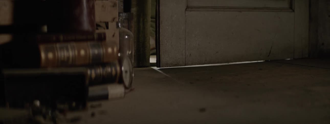 Man opens a door and steps inside