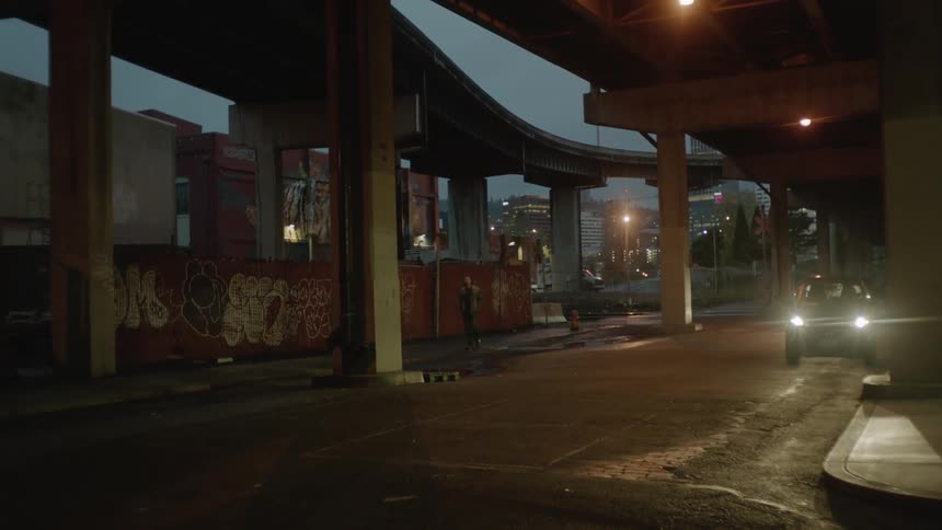 A car drives under the overpass