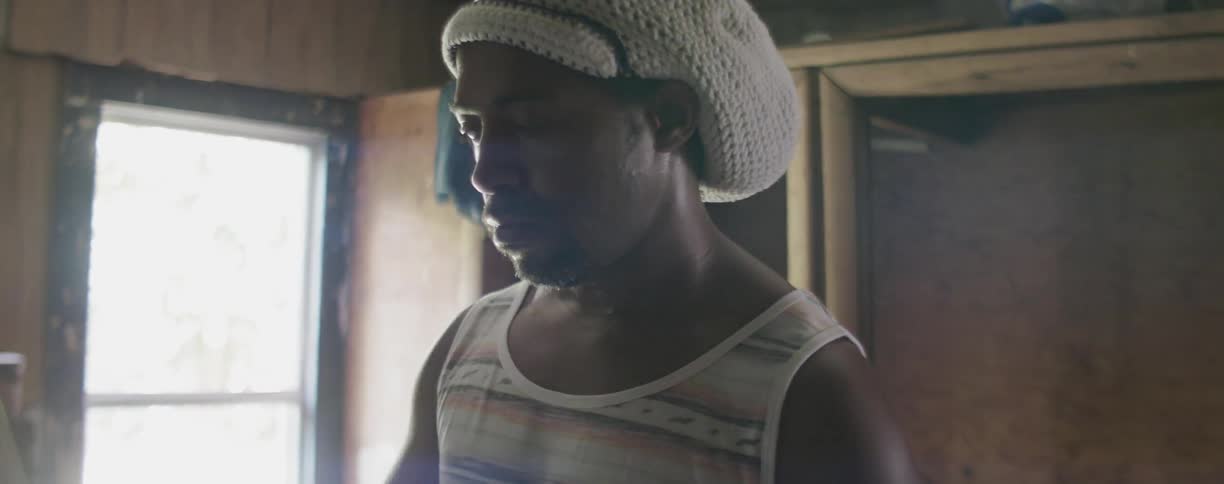 A man plays on a drum set