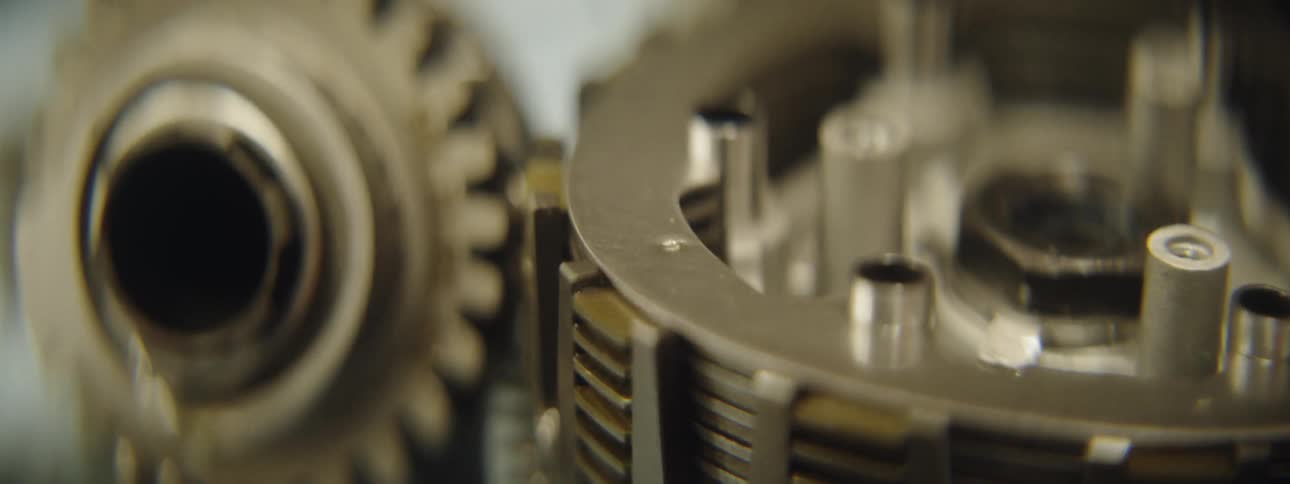 The gears laying on the table are still