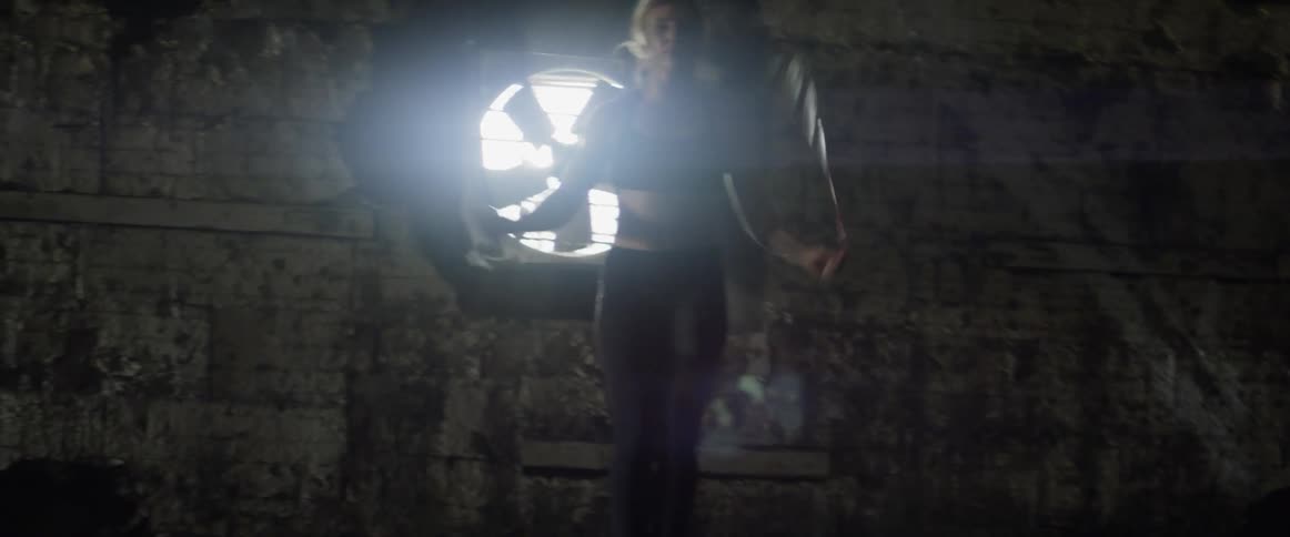 A woman works out by jumping rope