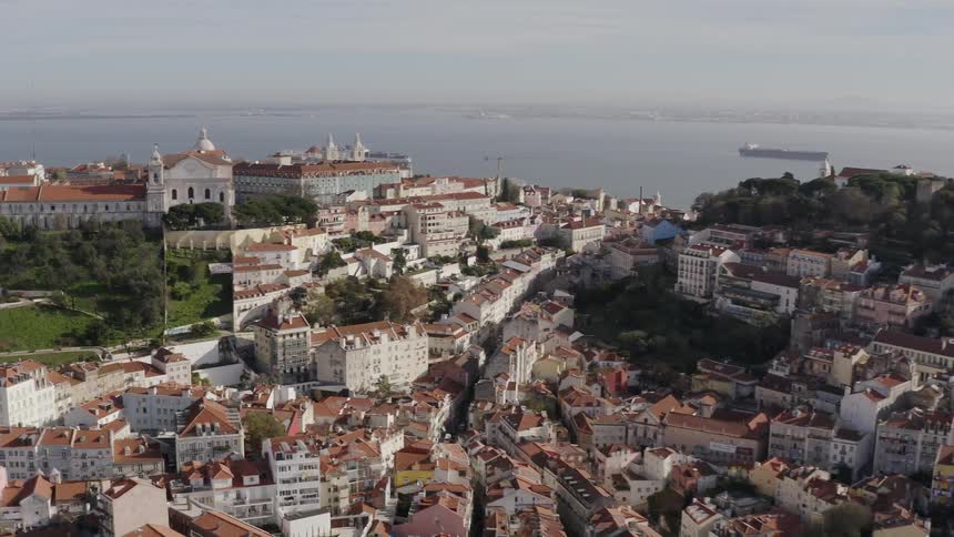 Buildings sit on a coastline