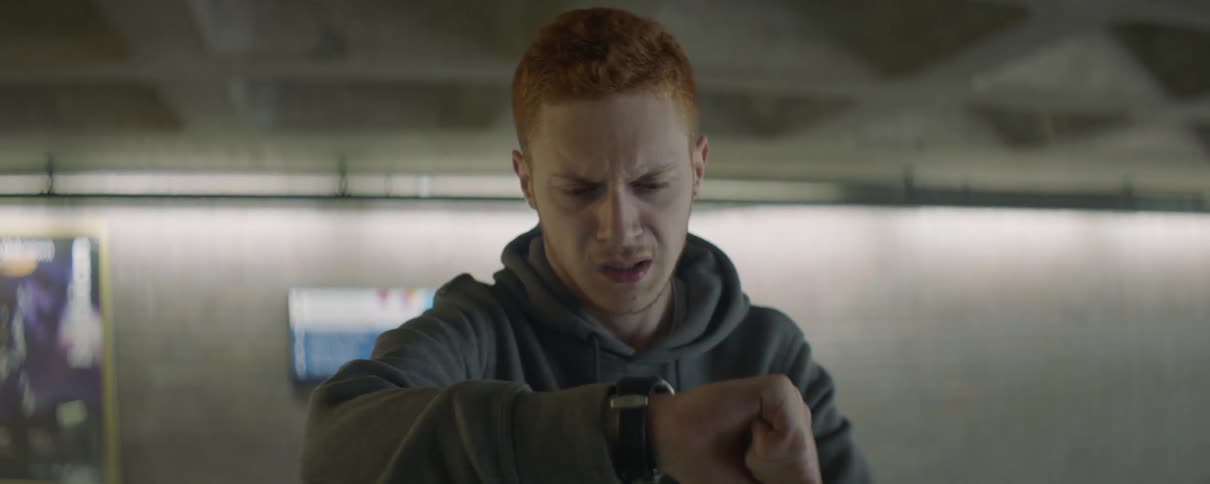 Man is frustrated after looking at his watch
