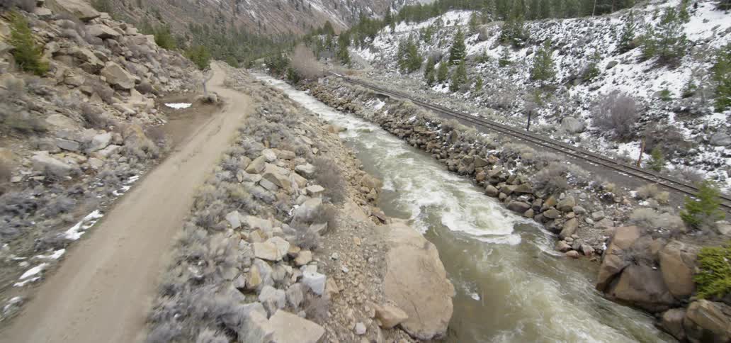 Water flows through rocky terrain