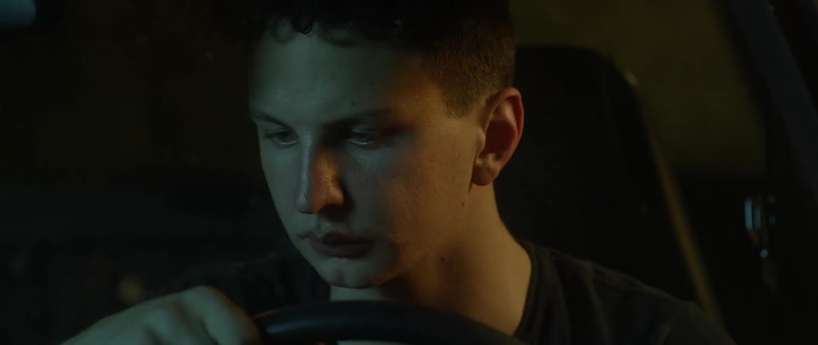 Man sits in a parked car
