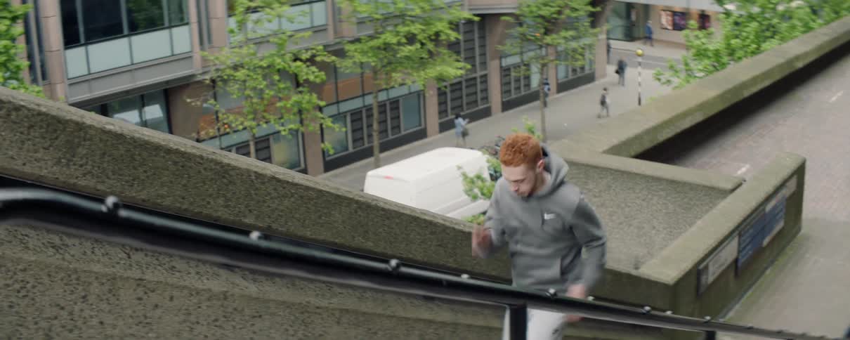 Man runs up city steps