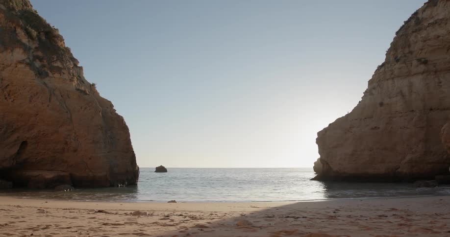 Rock formations stand on a beach
