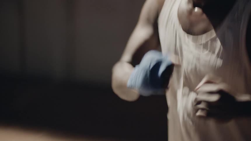 Man is practicing boxing