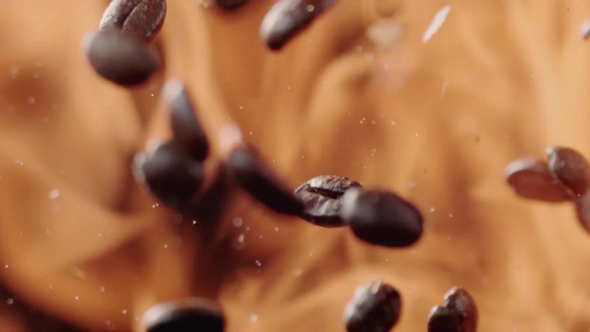 Coffee beans are falling through flames
