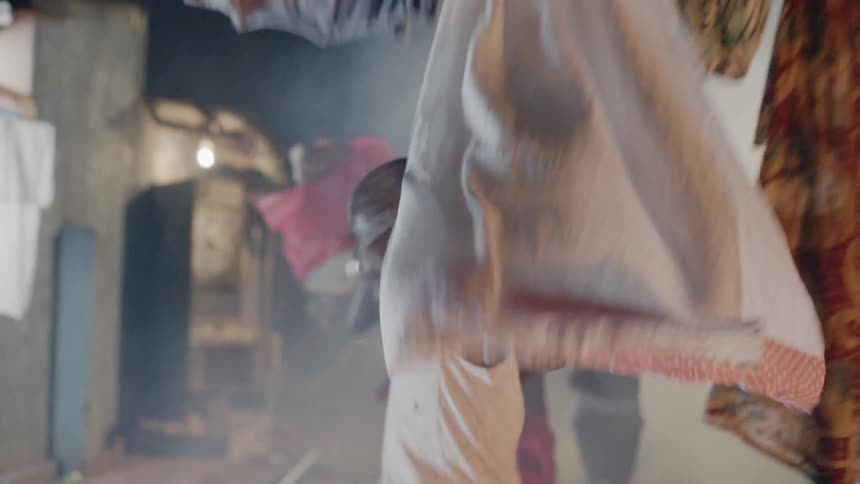 Boy chased by other boys at night