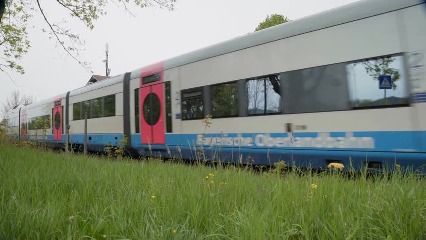 A train passes along the town