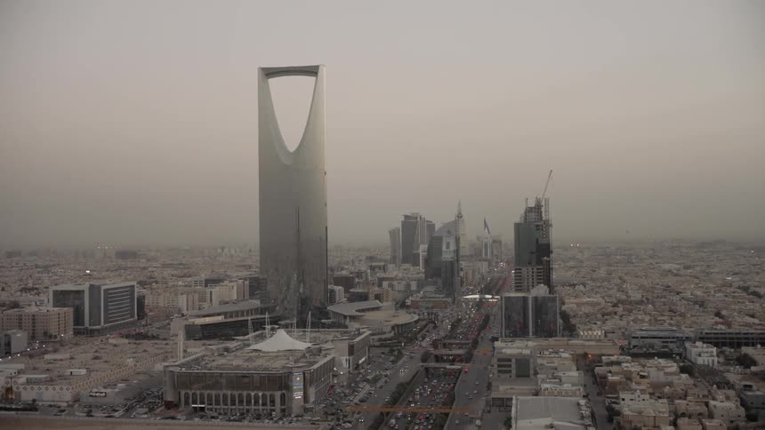 The tall tower is in the center of the city