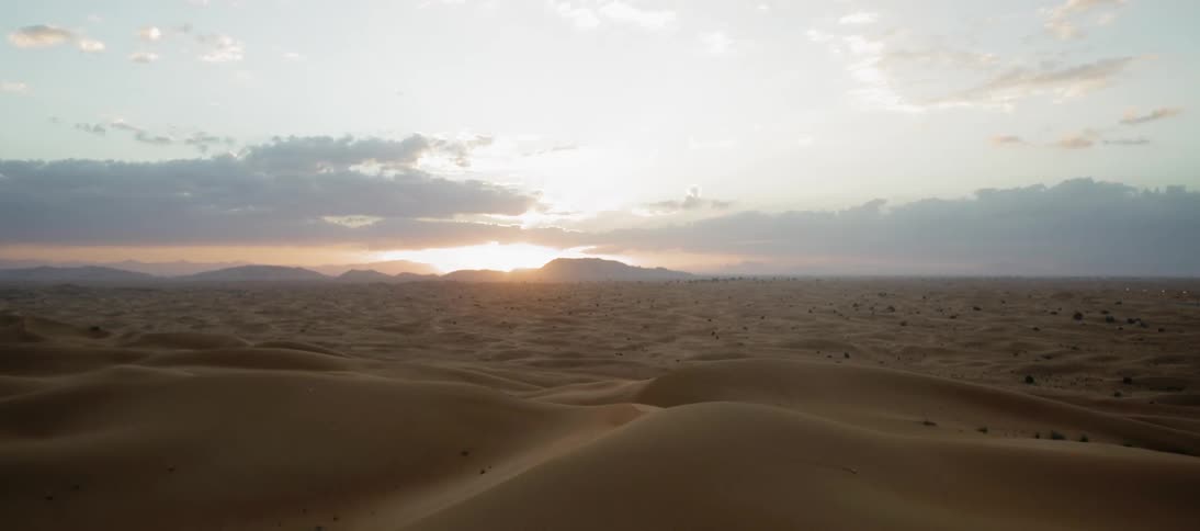 Desert dunes at sunset