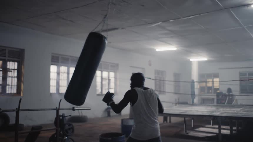 Boxer hits a punching bag