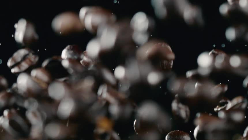 Coffee beans rise into the air