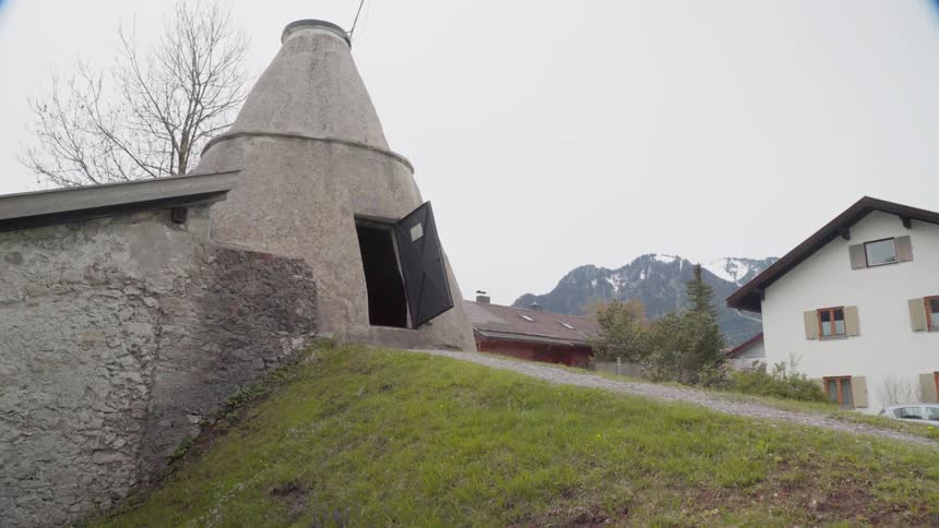 A building sits on a hill