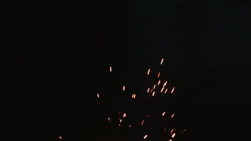 Fireworks shooting in the night sky