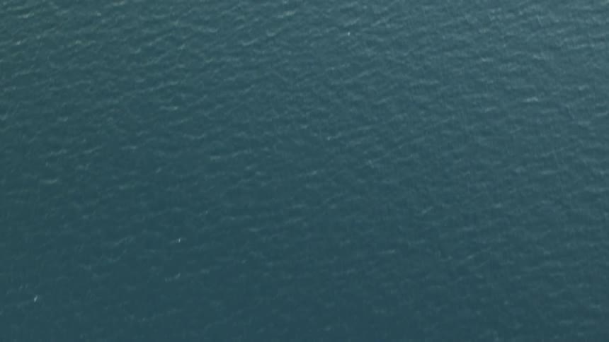 The lake water ripples as it flows