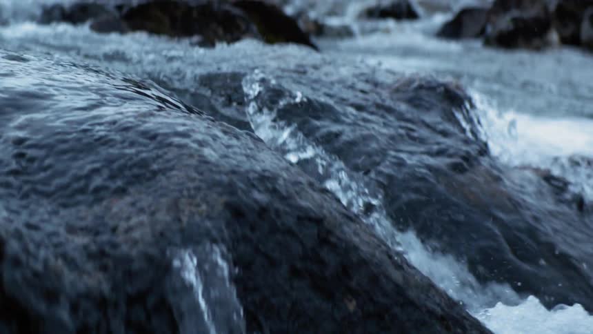 River water flows over rocks