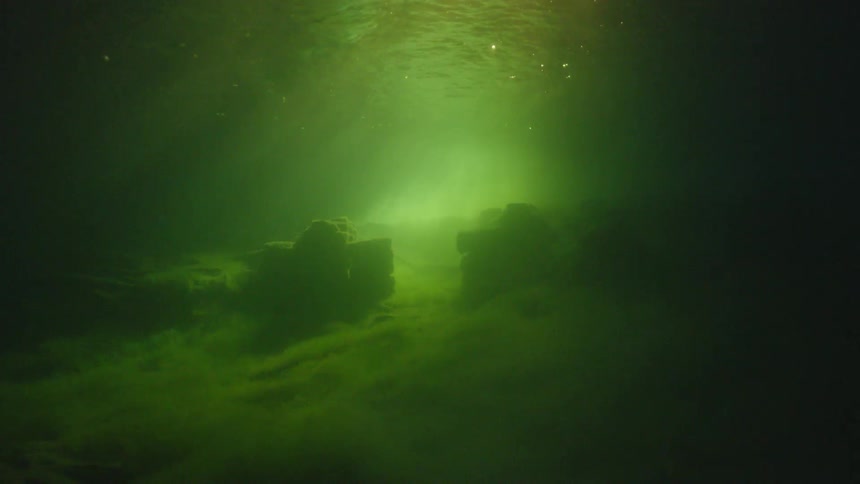 Light streams under water