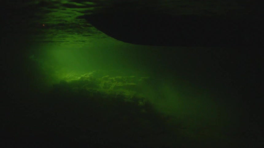 Bottom of a boat moving in the water