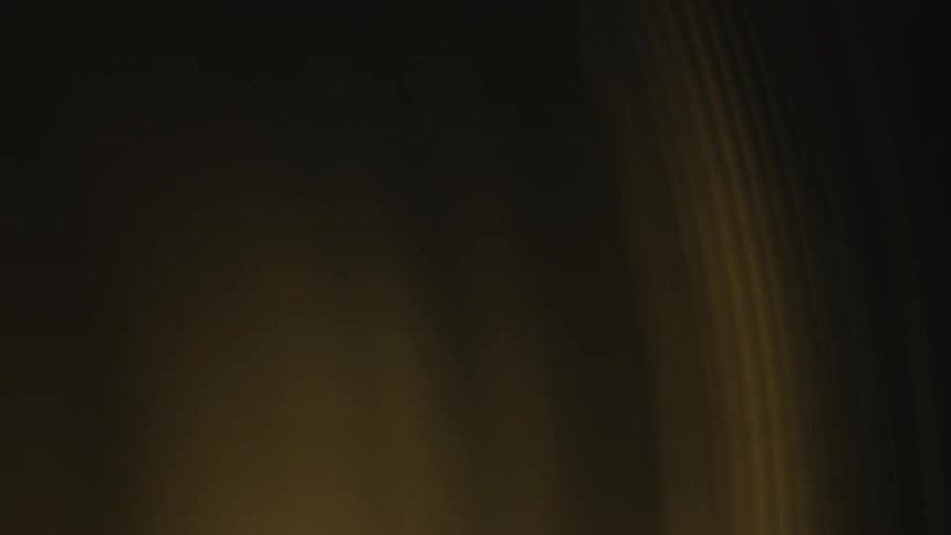 Light glows then fades several times off an object