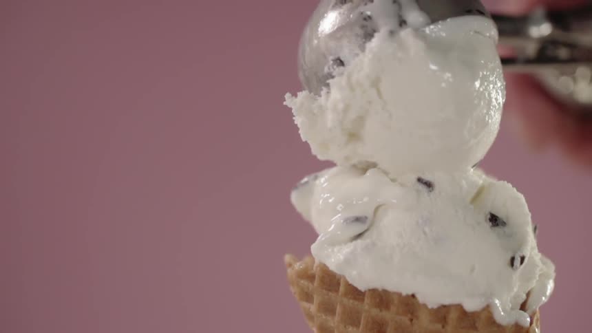 Ice cream scoops are placed in a cone