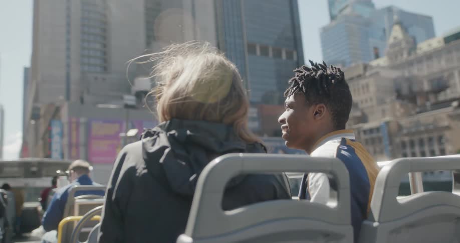 A young man and woman take a city tour
