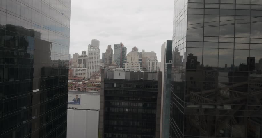 The skyscrapers have reflective walls