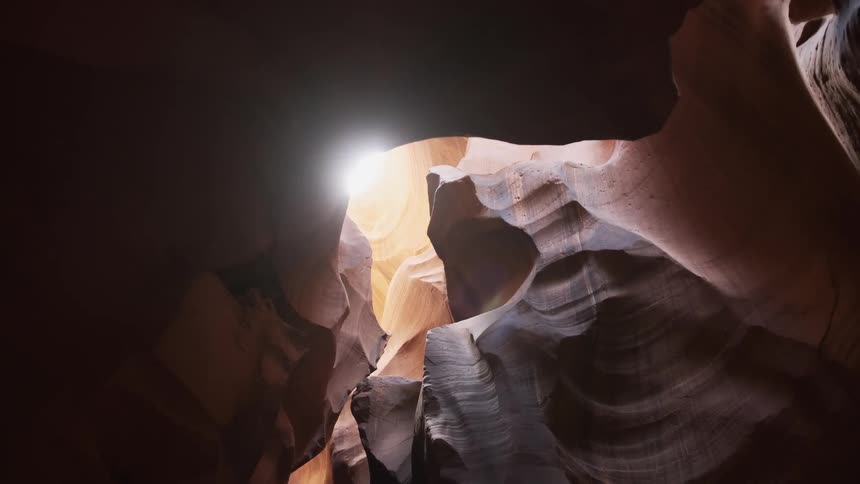 The sun peaks into the dark cave