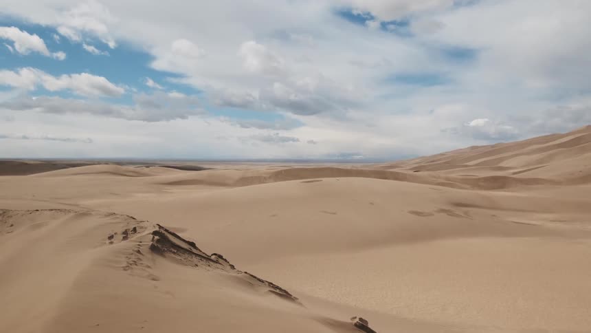 Wide view of large sand dunes