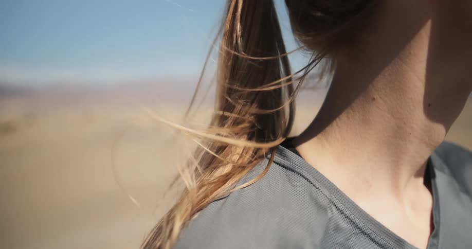 Wind blows through a woman's hair