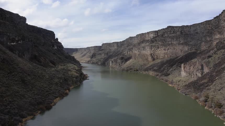 A river flows through a canyon