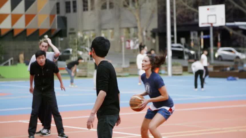 Women Playing Basketball On Outdoor Court