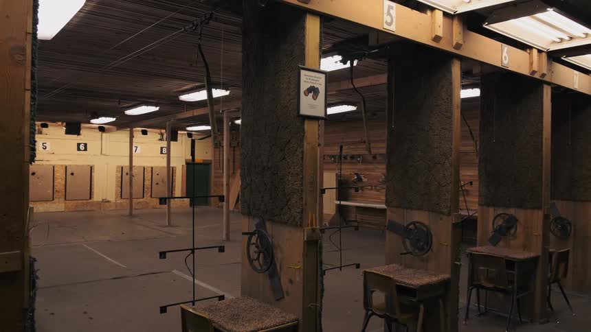 The gun range is empty with all the booths clear