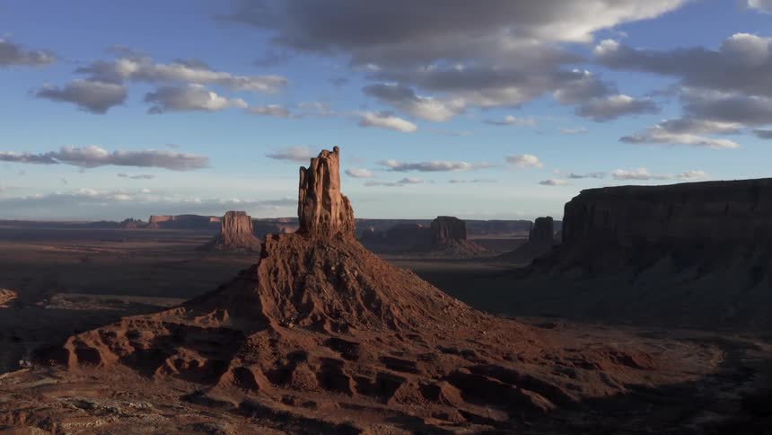 Aerial of large desert rock formation
