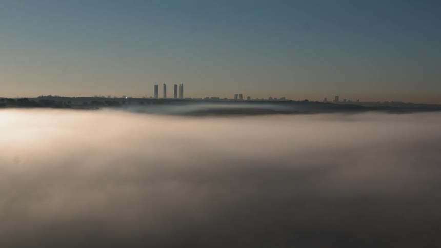 The clouds cover the ground below